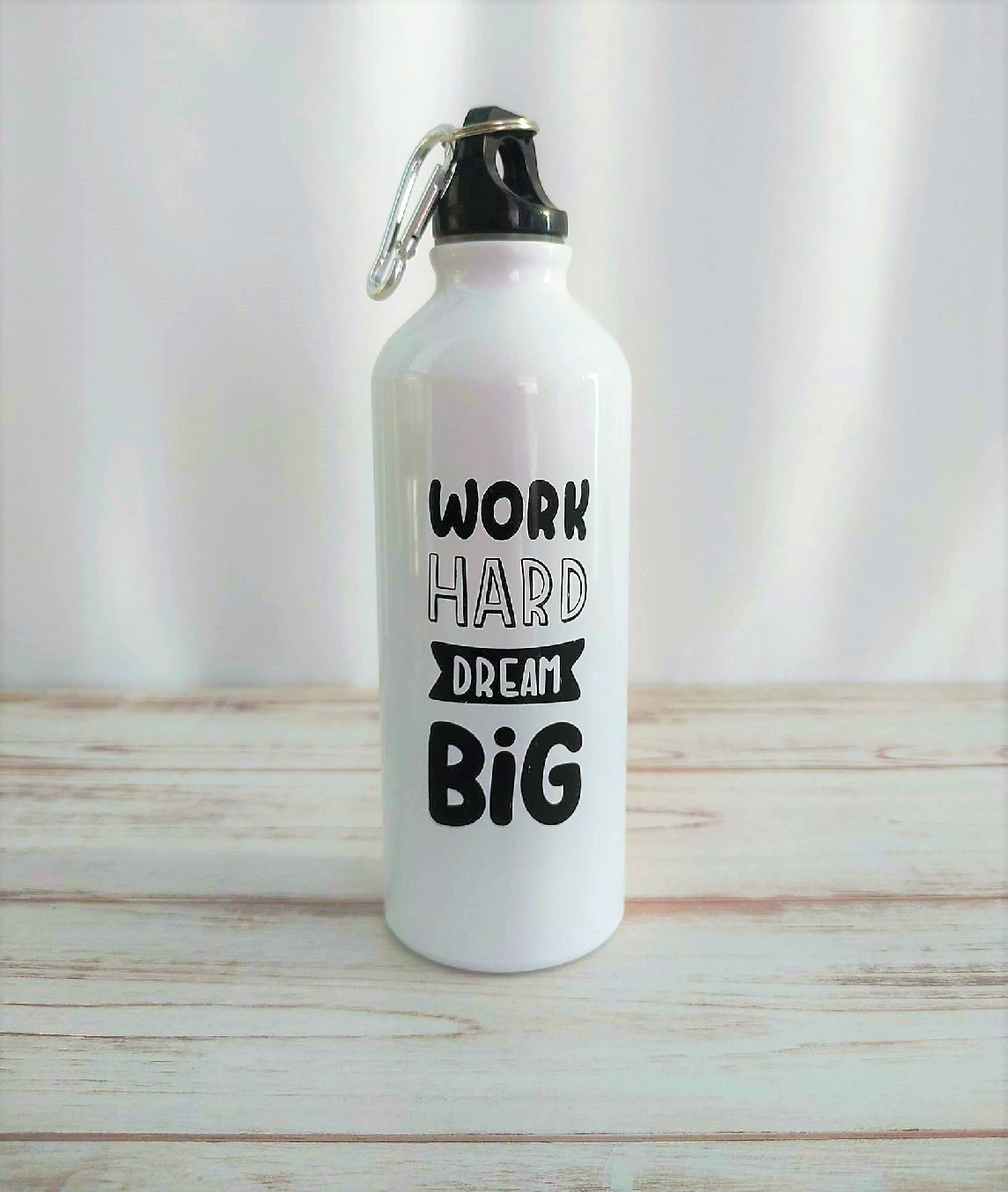 botella-pequeña-de-agua-con-frase-original.jpeg