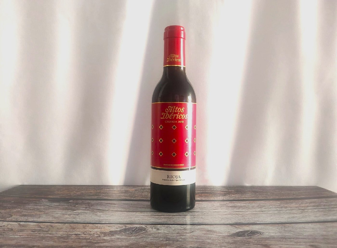 botella-pequeña-de-vino-tinto-aperitivos-a-domicilio.jpeg